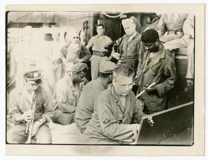 Primary view of object titled '[Band Playing Music Aboard Ship at Sea]'.