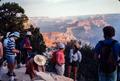 Photograph: [People looking around the Grand Canyon]