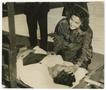Photograph: [Jane Kendeigh with Solider on Bunk]
