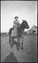 Photograph: [Woman on horseback]