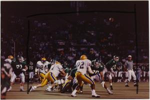 Primary view of object titled '[North Texas Eagles vs. McNeese State Cowboys]'.