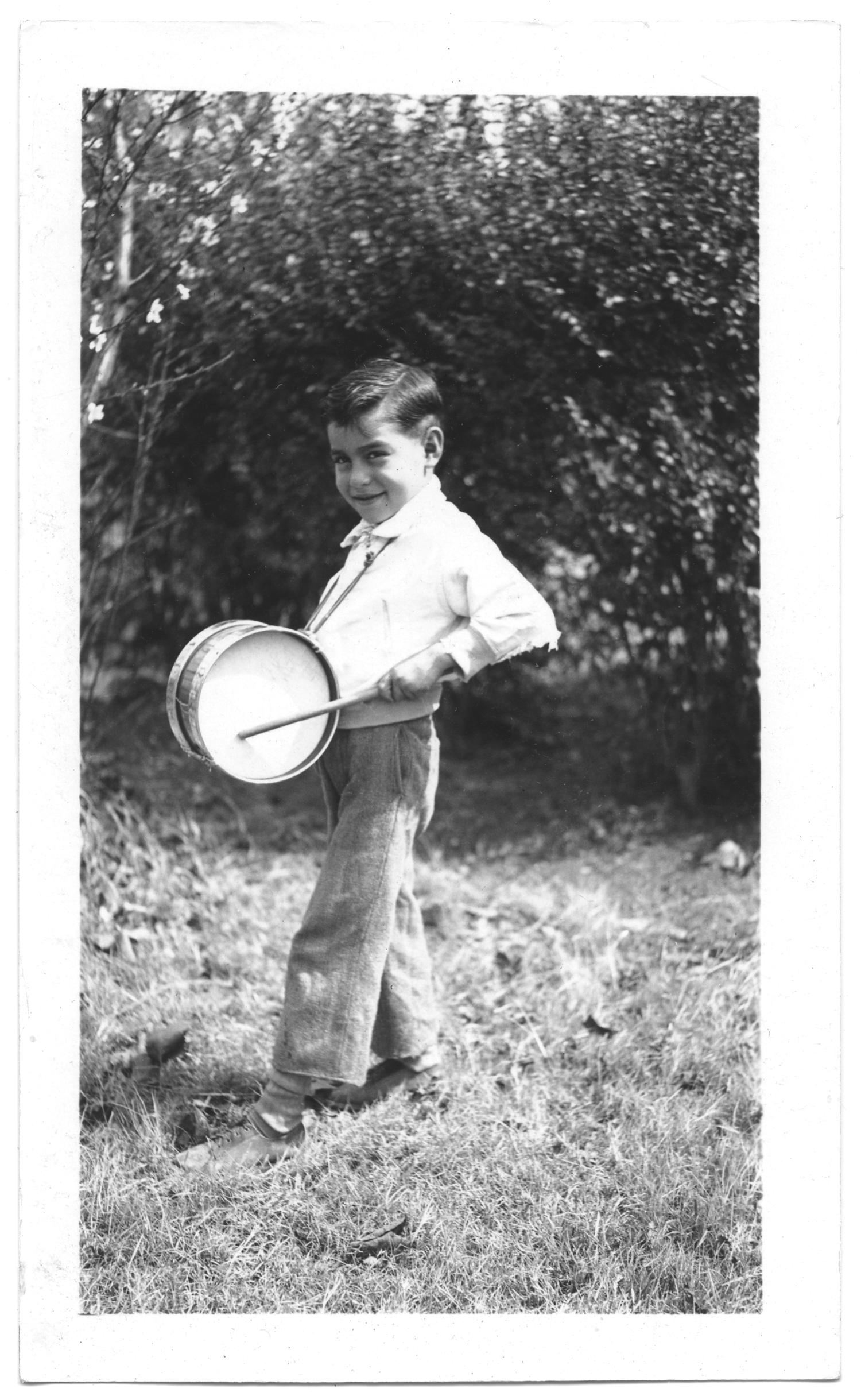 [Boy Playing a Drum]
                                                
                                                    [Sequence #]: 1 of 2
                                                