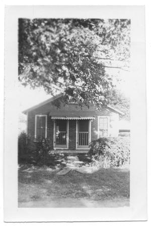 Primary view of object titled '[Small Brick House with Two Front Doors]'.