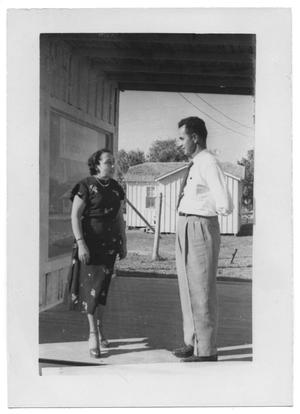 Primary view of object titled '[Two Hispanic People Facing Each Other]'.