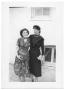 Primary view of [Two Ladies Smiling and Standing Together]
