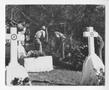 Photograph: [Grave Diggers in a Cemetery]
