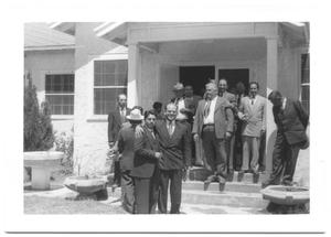 Primary view of object titled '[Group of Gentlemen Standing in Church Entrance]'.