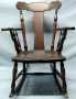 Thumbnail image of item number 1 in: 'Brown wooden rocking chair'.