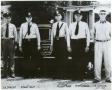 Primary view of [Arlington Police Officers, 1948: J.W. Dunlop, Frank Kelly, Minor Moore, Hugh Robinson and S. (Oscar) Webster in front of a police car]