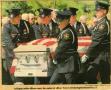 Thumbnail image of item number 1 in: '[Arlington Police Officer Terry Lewis's casket carried by the Honor Guard during his funeral, newspaper clipping, 1992]'.