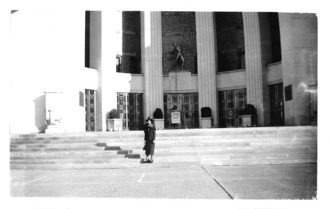 [Emma Phillippi standing in front of a building at the World's Fair in Dallas, TX]
                                                
                                                    [Sequence #]: 1 of 1
                                                
