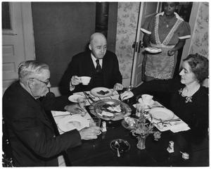 Primary view of object titled 'Photograph of Sam Rayburn Eating Breakfast'.