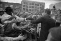 Primary view of [President Kennedy greeting crowd outside of Hotel Texas]