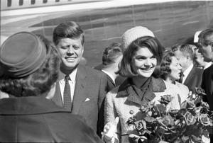 Primary view of object titled '[The Kennedys greeting local dignitaries at Love Field]'.