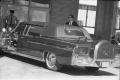 Photograph: [Presidential limousine with top attached at Parkland Hospital]