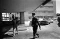 Photograph: [A Dallas Police officer entering Parkland Hospital on November 24, 1…