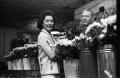 Thumbnail image of item number 1 in: '[Dallas florists with roses to be used to decorate the Dallas Trade Mart]'.