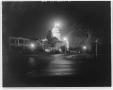 Primary view of [The exterior of the Capitol building at night]