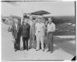 Photograph: Group of Unidentified Men in Front of Airplanes