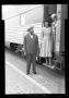 Photograph: [Photograph of People by a Train]