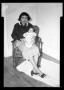 Photograph: [Photograph of A Woman Holding a Child]