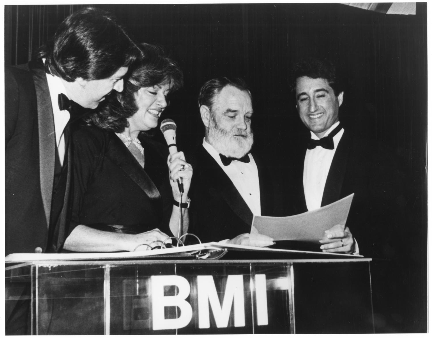 [Photograph of Bill Hall At a Podium During a BMI Event]
                                                
                                                    [Sequence #]: 1 of 2
                                                