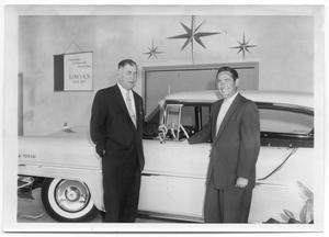 Primary view of object titled 'John and Ted Clegg in Lincoln-Mercury Showroom, 1957'.