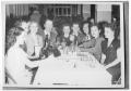 Primary view of [Photograph of Jane Russell with a Group of People]