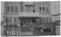 Photograph: [Stranded Car in Front of Theatre]