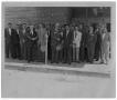 Primary view of [Men in Front of Building]