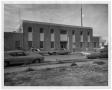 Photograph: [Cars in Front of Police Station]