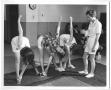 Photograph: [Photograph of a Group of Women Stretching]