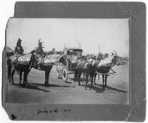 Primary view of object titled '[Buggy and two horses in parade]'.