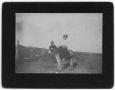 Primary view of [Emma Henard riding a mule]