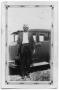 Primary view of [Dowl Chambliss standing by car]