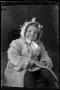 Photograph: [Young child wearing a fur coat]