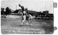 Primary view of Bob Calen trick riding - Cowboy Championship Contest, c. 1920