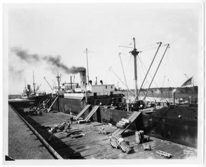 Primary view of object titled '[Cargo ship unloading, Houston port]'.