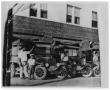 Primary view of [Frank Gabino and employees outside of Alamo Furniture Company shop]