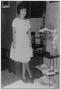 Primary view of [Bernice Kinkaid posing in an office]