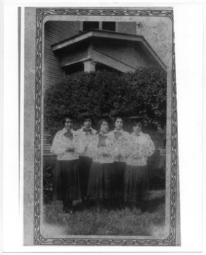 Primary view of object titled '[Four female graduates of Our Lady of Guadalupe School]'.