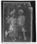 Photograph: [Photograph of a young boy and a girl holding hands]