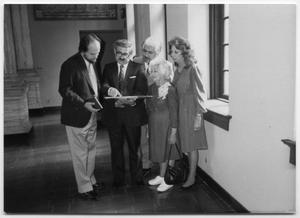 Primary view of object titled '[Tom Kreneck and group at the Julia Ideson Building]'.