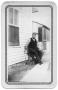 Photograph: [Hans Peter Jensen Sitting Outside His Home]