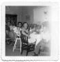 Photograph: [Hansen Family Seated at the Dinner Table]