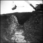 Thumbnail image of item number 1 in: '[Mobile Crane at a Watery Ditch]'.