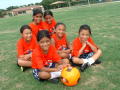 Primary view of [Girls pose with soccer ball]