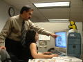 Thumbnail image of item number 1 in: '[Juan A. Ramos pointing to computer screen]'.