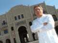 Thumbnail image of item number 1 in: '[Jose Legaspi in front of building]'.