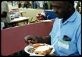 Thumbnail image of item number 1 in: '[Man with Plate of Food]'.
